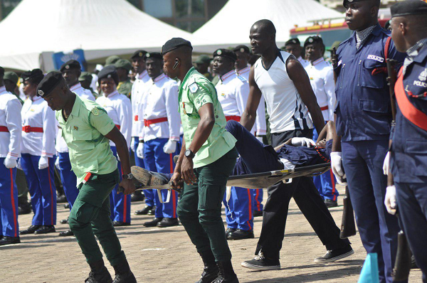 Some personnel of the Ghana Ambulance Service carrying an officer of the Ghana Police Service, who collapsed at the anniversary parade at the Jubilee Park in Kumasi. Picture: EMMANUEL BAAH Some personnel of the Ghana Ambulance Service carrying an officer of the Ghana Police Service, who collapsed at the anniversary parade at the Jubilee Park in Kumasi. Picture: EMMANUEL BAAH