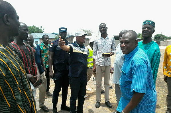 Alhaji Boniface Saddique (middle) interacting with some leaders in the Zongo Communities during his visit to the Upper East Region