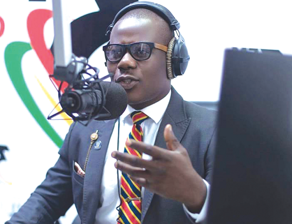 Johnnie Hughes doing what he loves best