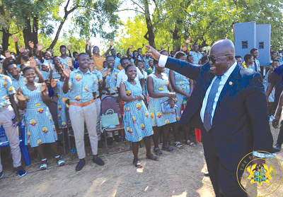 President Akufo-Addo responding to cheers from the students President Akufo-Addo responding to cheers from the students