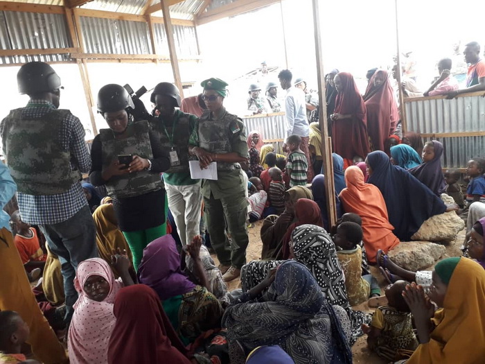 Inspector Rachel Malambo interacting with some of the internally displaced persons Inspector Rachel Malambo interacting with some of the internally displaced persons