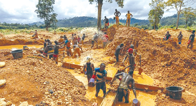 Some Ghanaians engaging in illegal mining Some Ghanaians engaging in illegal mining