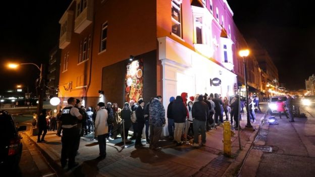 Customers queued outside Tweed in St John's as midnight approached Customers queued outside Tweed in St John's as midnight approached