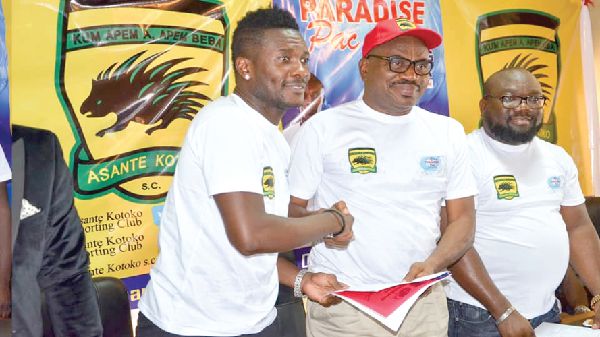 Asamoah Gyan (left) in a handshake with Kotoko CEO, George Amoako Asamoah Gyan (left) in a handshake with Kotoko CEO, George Amoako
