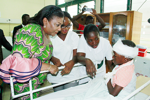 The First Lady, Mrs Rebecca Akufo-Addo, speaking to one of the victims The First Lady, Mrs Rebecca Akufo-Addo, speaking to one of the victims
