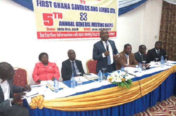 Dr John Kwaku Asamoah (standing) explaining a point as other board members look on. Dr John Kwaku Asamoah (standing) explaining a point as other board members look on.