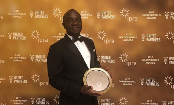 Mr Ernest Boateng, CEO, GMA, displaying the company’s award Mr Ernest Boateng, CEO, GMA, displaying the company’s award