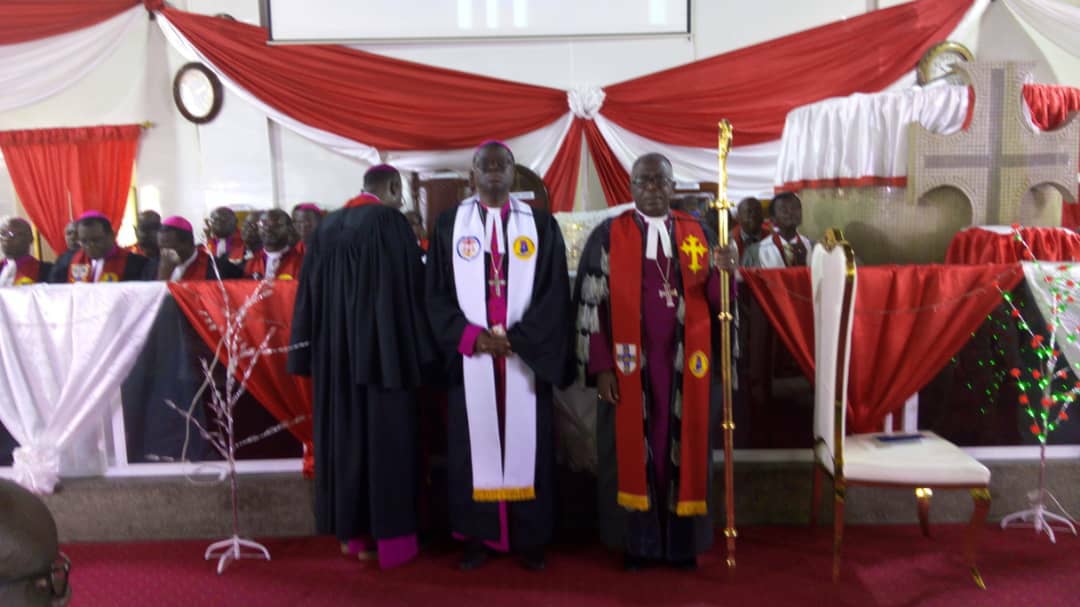 Rev Dr Asare Kusi (midle) inducted as Koforidua Methodist Bishop. Standing with him holding the staff is Most Rev Dr Paul Boafo, Presiding Bishop of Methodist Church Ghana Rev Dr Asare Kusi (midle) inducted as Koforidua Methodist Bishop. Standing with him holding the staff is Most Rev Dr Paul Boafo, Presiding Bishop of Methodist Church Ghana
