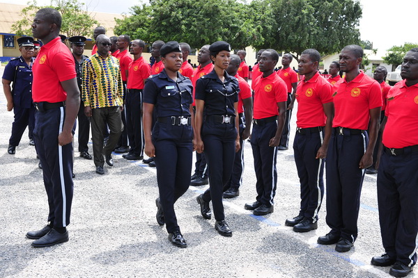  Mr Kwaku Asomah-Cheremeh, the Minister of Lands and Natural Resources,  inspecting a parade mounted by the mining guards at the graduation ceremony 