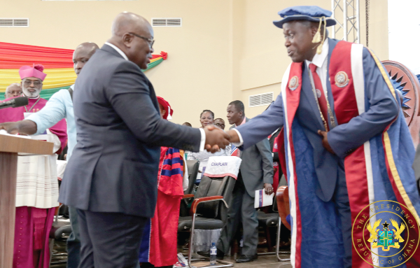 President Akufo-Addo congratulating Prof. Afful Broni after his investiture Build bridges of reconciliation - President tells new UEW VC