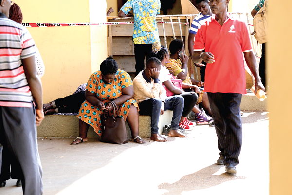 Anxious parents waiting at the Black Star Square to have their problem with school placement solved for their wards. Picture: EMMANUEL ASAMOAH ADDAI Anxious parents waiting at the Black Star Square to have their problem with school placement solved for their wards. Picture: EMMANUEL ASAMOAH ADDAI