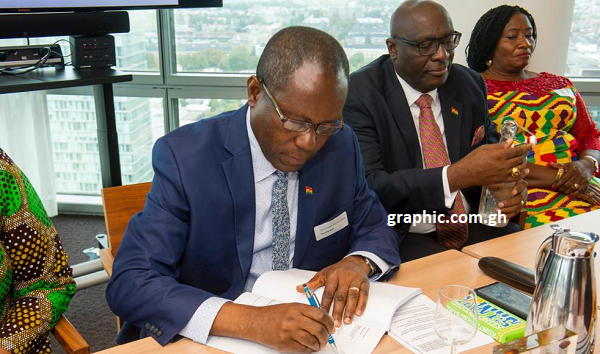 Mr Joseph Boahen Aidoo, the CEO of COCOBOD, signing the agreement on behalf of COCOBOD. Those with him are Mr Papa Owusu Ankomah, Ghana's High Commission to UK, and Nana Adwoa Dokua, a board member of COCOBOD. Mr Joseph Boahen Aidoo, the CEO of COCOBOD, signing the agreement on behalf of COCOBOD. Those with him are Mr Papa Owusu Ankomah, Ghana's High Commission to UK, and Nana Adwoa Dokua, a board member of COCOBOD.