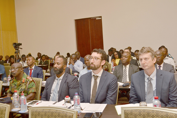 • Mr Albert Kan-Dapaah (INSET), Minister of National Security, addressing the participants in the meeting • Mr Albert Kan-Dapaah (INSET), Minister of National Security, addressing the participants in the meeting