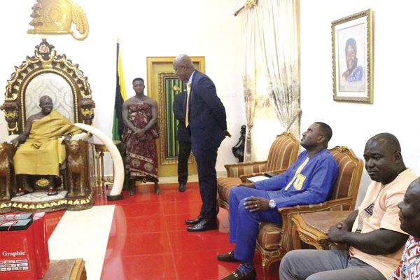 Mr Ato Afful (standing), addressing the Asantehene, during the courtesy call. Seated from right are Mr Frederick Akuamoah, Zonal Manager for Ashanti, Bono and the three Northern regions, and Director of Marketing, Mr Franklin Sowa Mr Ato Afful (standing), addressing the Asantehene, during the courtesy call. Seated from right are Mr Frederick Akuamoah, Zonal Manager for Ashanti, Bono and the three Northern regions, and Director of Marketing, Mr Franklin Sowa