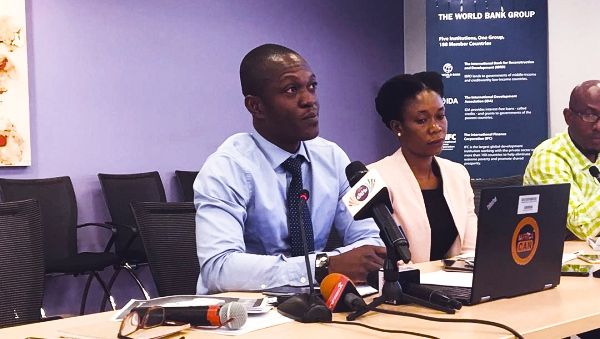 Mr Kwabena Gyan Kwakye (right) addressing the media