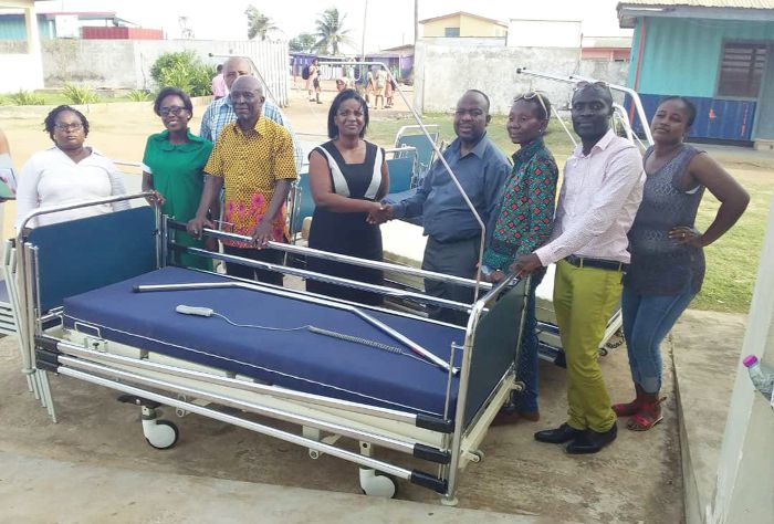Mr Adu-Amankwah (4th right), leader of the delegation, handing over some medical equipment to Mrs Nana Konadu Darko, the Medical Officer in-charge, Manhean Polyclinic, Tema. Those with them include some health officers and the delegation from Belgium Mr Adu-Amankwah (4th right), leader of the delegation, handing over some medical equipment to Mrs Nana Konadu Darko, the Medical Officer in-charge, Manhean Polyclinic, Tema. Those with them include some health officers and the delegation from Belgium