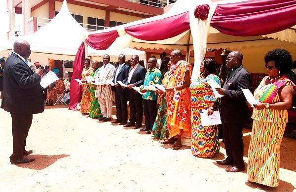 The Magistrate of the Ajumako-Enyan-Essiam District Court, Mr Francis Rockson Kpodo, swearing in the new board into office The Magistrate of the Ajumako-Enyan-Essiam District Court, Mr Francis Rockson Kpodo, swearing in the new board into office