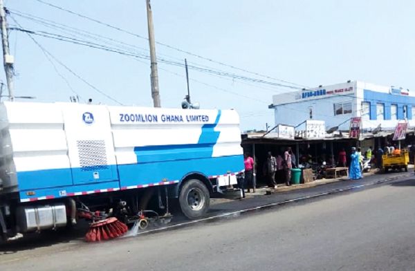 One of the street sweepers at work on the Nima-Maamobi road in Accra One of the street sweepers at work on the Nima-Maamobi road in Accra