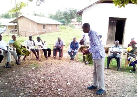 Mr Daniel Agbesi Latsu (standing), NCCE District Director, addressing participants Mr Daniel Agbesi Latsu (standing), NCCE District Director, addressing participants