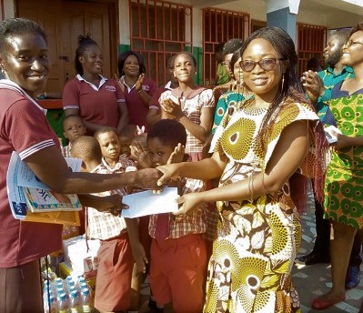 Mrs Charity Opare (left) handing over the items to Mrs Lina Amoabeng Mrs Charity Opare (left) handing over the items to Mrs Lina Amoabeng