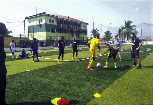 The German trainers supervising the youth go through some drills The German trainers supervising the youth go through some drills