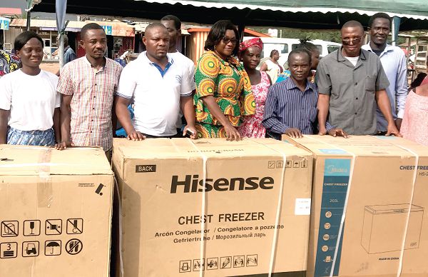Mrs Janet Tulasi Mensah (4th left), MCE of Ga East Municipal Assembly, with some of the beneficiaries Mrs Janet Tulasi Mensah (4th left), MCE of Ga East Municipal Assembly, with some of the beneficiaries