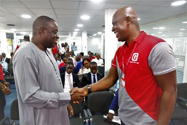 Pix (1 ) Dr Mohammed Ibrahim Awal (left), Minister for Busioness Development in a handshake with Mr Ato Afful, Managing Director, GCGL at the Tertiary Business Sense Competition in Accra. Picture by SAMUEL TEI ADANO