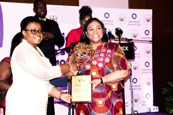  First Lady, Mrs Rebecca Akufo-Addo, presenting an award to Brig. Gen. Constance Ama Emefa Edjeani-Afenu, the first woman to become a Brigadier General in the Ghana Armed Forces (GAF), at the event. Picture: EDNA ADU-SERWAA