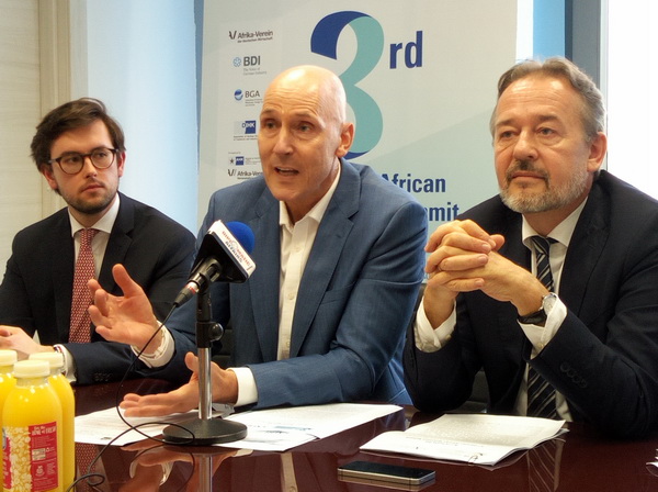 Mr Christoph Retzlaff (right), Mr Michael Blank (middle) and Mr Mark Show listening to journalists during the press briefing at the Octagon building.