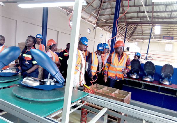 The Burkinabe delegation being shown round the factory of Prefos company