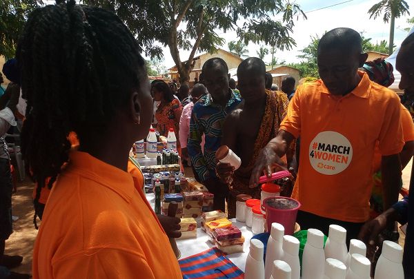 Mr Isaac Odoom DCE, Asikuma Odoben Brakwa looking at products at the exhibition Mr Isaac Odoom DCE, Asikuma Odoben Brakwa looking at products at the exhibition