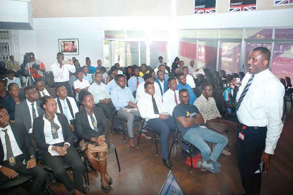 Mr Frankline Sowa (right), Director, Marketing, addressing students before the start of the competition Mr Frankline Sowa (right), Director, Marketing, addressing students before the start of the competition