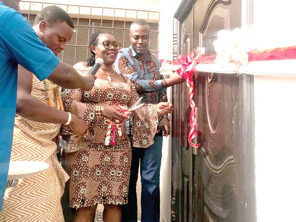 Mrs Ursula Owusu-Ekuful (middle) cutting the tape to inaugurate the project Mrs Ursula Owusu-Ekuful (middle) cutting the tape to inaugurate the project