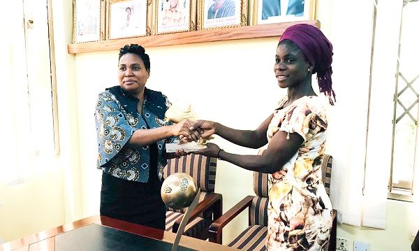 A member of the GFA Normalisation Committee, Naa Odofoley Nortey (left), presenting the award to Mukarama Abdulai A member of the GFA Normalisation Committee, Naa Odofoley Nortey (left), presenting the award to Mukarama Abdulai