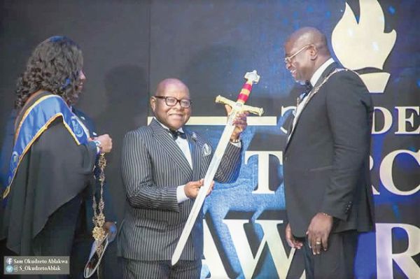 Prof. Mike Oquaye (middle) after he had received the PRESEC Grand Companion Award Prof. Mike Oquaye (middle) after he had received the PRESEC Grand Companion Award