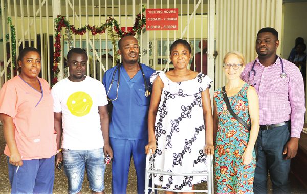Dr Bulley (third left) flanked by Mr and Mrs Asimatey. With them are some members of the medical team Dr Bulley (third left) flanked by Mr and Mrs Asimatey. With them are some members of the medical team
