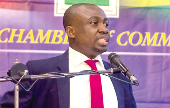 Mr Abeku Gyan Quansah, addressing the members of AMCHAM at the meeting