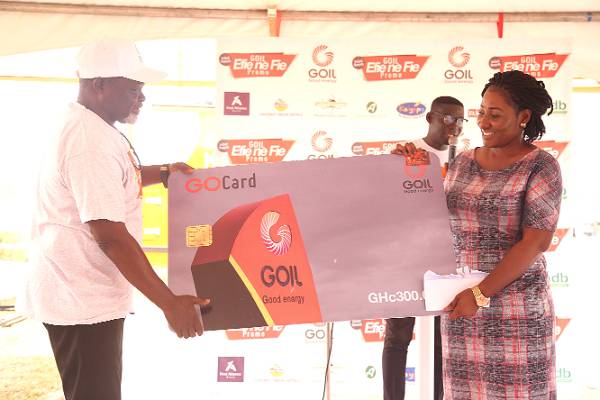 Boxing legend, Azumah Nelson (left) presenting a prize to one of the winners of the promotion Boxing legend, Azumah Nelson (left) presenting a prize to one of the winners of the promotion