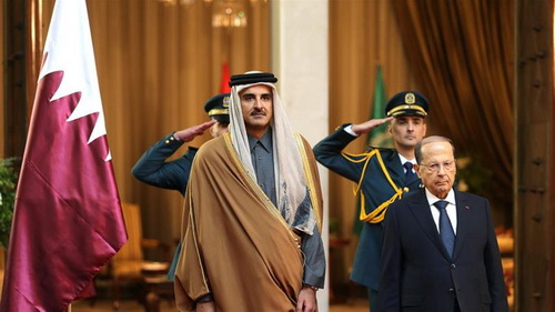 Sheikh Tamim met with Lebanon's President Aoun at the Arab Economic and Social Development summit in Beirut [Mohamed Azakir/Reuters]