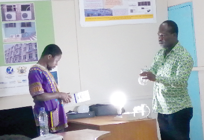 Dr Richard Opoku taking a participant through a demonstration Dr Richard Opoku taking a participant through a demonstration