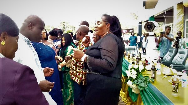 Nana Ama Ampomah with the Regional Minister, Mr Simon Osei Mensah.