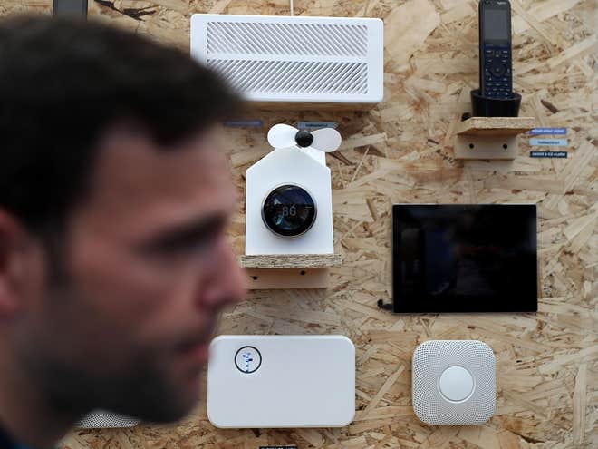 An attendee passes a display of Nest products during Google I/O 2016 at Shoreline Amphitheatre on 19 May, 2016 in Mountain View, California (Getty Images) An attendee passes a display of Nest products during Google I/O 2016 at Shoreline Amphitheatre on 19 May, 2016 in Mountain View, California (Getty Images)