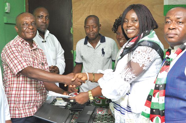 Ms Rita Odoley Sowah (right) presenting her nomination forms to Mr Abraham Oko Kotey (left), Director of Elections, La Dadekotopon NDC. Picture: NII MARTEY M. BOTCHWAY Ms Rita Odoley Sowah (right) presenting her nomination forms to Mr Abraham Oko Kotey (left), Director of Elections, La Dadekotopon NDC. Picture: NII MARTEY M. BOTCHWAY