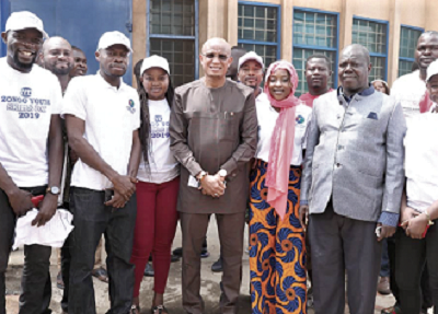 Dr Mustapha Abdul-Hamid (arrowed), Minister of Inner Cities and Zongo Development, with members of the Initiative for Youth Development and Alhaji Baba Saddique (in suit), the deputy Chief Executive Officer of the Zongo Development Fund 