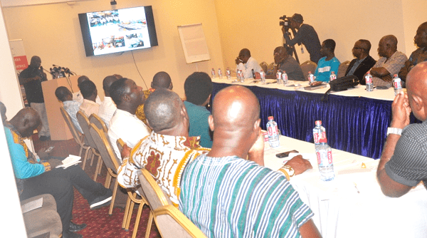 INSET:  The Chairman of the governing body of the Fisheries Commission,  Mr Emmanuel Mantey Mensah, launching the report. A section of the participants at the launch of the report in Accra. 