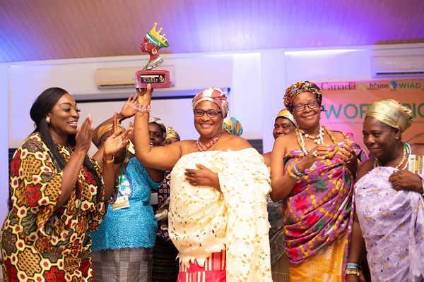 The queenmother of Abutia Kloe, Mama Ayipe, with her Royal Agro award while CEO of Sidalco, Rev. Mrs Gifty Lamptey (left) cheers her on The queenmother of Abutia Kloe, Mama Ayipe, with her Royal Agro award while CEO of Sidalco, Rev. Mrs Gifty Lamptey (left) cheers her on