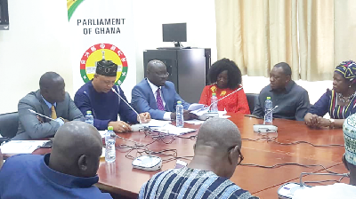 Mr Adam Mutawakilu (in hat) making a point at the press conference Mr Adam Mutawakilu (in hat) making a point at the press conference