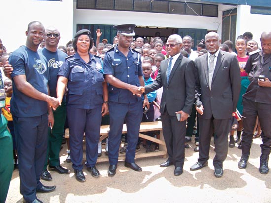 Pastor Mark Hardo (2nd right) exchanging pleasantries with Superintendent Douglas Kumah Pastor Mark Hardo (2nd right) exchanging pleasantries with Superintendent Douglas Kumah