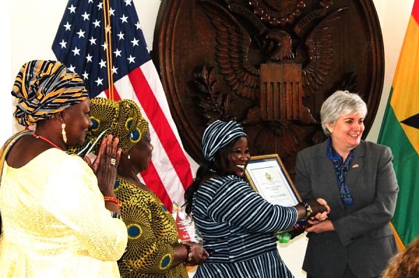 Ms Stella Saaka (3rd left) receiving a citation from Ms Stephanie Sanders Sullivan. With them are some members of the Women in Agriculture Platforms Ms Stella Saaka (3rd left) receiving a citation from Ms Stephanie Sanders Sullivan. With them are some members of the Women in Agriculture Platforms