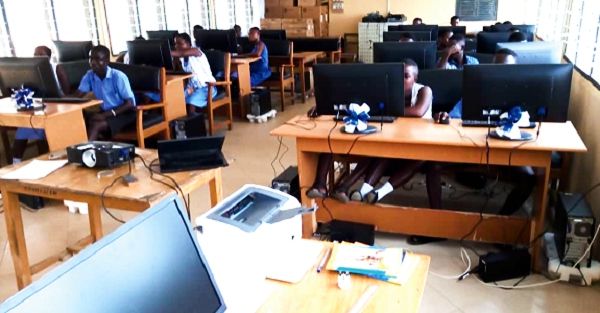 Students of the school trying their hands on the newly installed Hp desktop computers. Students of the school trying their hands on the newly installed Hp desktop computers.
